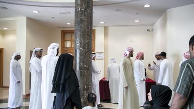 Fujairah residents at the Ministry of Culture and Knowledge Development. Reem Mohammed / The National