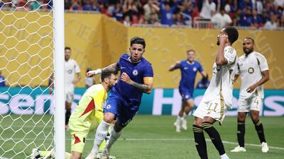 Enzo Fernandez wheels away in celebration after scoring Chelsea's second goal. AFP