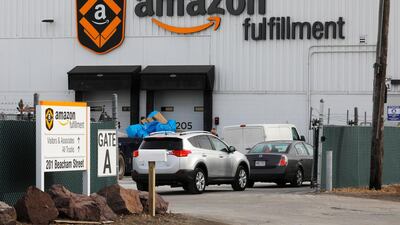 Sales gained 38 percent to $60.5 billion in the fourth quarter for Amazon. REUTERS/Brian Snyder
