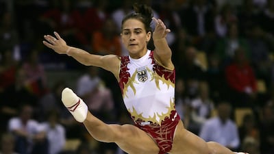 Oksana Chusovitina of Germany competes on the floor in the women's individual all-around final title at the Arena in Aarhus, October 19, 2006 at the 39th Artistic Gymnastics World Championships in Denmark.