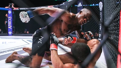 Muhidin Abubaker is brought by Luthando Biko in their flyweight bout during UAE Warriors Africa.