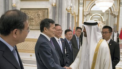 Sheikh Mohamed is introduced to the Chinese delegation.