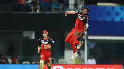 Mohammed Siraj of Royal Challengers Bangalore celebrates the wicket of Wriddhiman Saha. Sportzpics for IPL