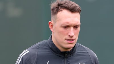 Manchester United defender Phil Jones attends training.