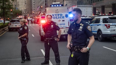 Officers at the crime scene. Bloomberg