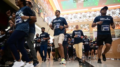 People take part in the Dubai Mallathon. AFP