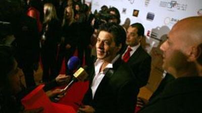The Bollywood star Shah Rukh Khan talks to reporters on the red carpet before the world premiere of My Name is Khan at the Emirates Palace in Abu Dhabi last night.