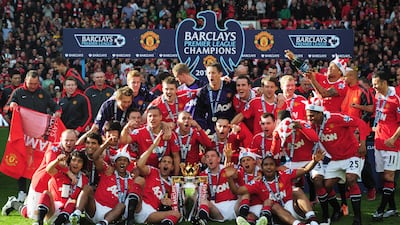 United celebrate with the Premier League trophy in 2010-11, when they won with 80 points. Getty