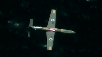 An unmanned airborne vehicle is struck by a high-power laser over the Mediterranean Sea. Ministry of Defence via AP