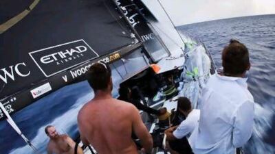 Pointing towards Miami as navigator Jules Salter looks into the distance, onboard Abu Dhabi Ocean Racing during leg 6 of the Volvo Ocean Race, from Itajai, Brazil, to Miami, USA. Nick Dana / Abu Dhabi Ocean Racing / Volvo Ocean Race