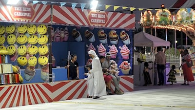 Kids playing games at A'l Bahar at the Corniche in Abu Dhabi. Pawan Singh / The National