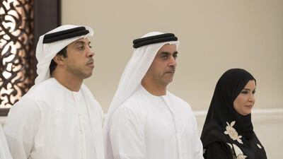 (L-R) Sheikh Mansour bin Zayed, Deputy Prime Minister and Minister of Presidential Affairs, Sheikh Saif bin Zayed, Deputy Prime Minister and Minister of Interior and Dr Amal Al Qubaisi, Speaker of the Federal National Council attend an iftar reception at Al Bateen Palace. Ryan Carter / Crown Prince Court — Abu Dhabi