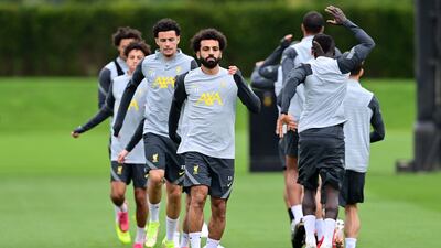 Liverpool's Mohamed Salah with teammates ahead of their Champions League game. AFP