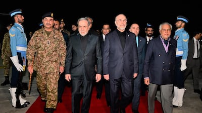 Pakistan's Foreign Minister Ishaq Dar, right, and army chief Field Marshal Asim Munir escort Iran's Foreign Minister Abbas Araghchi, second right, and Parliament Speaker Mohammad Bagher Ghalibaf upon their arrival for the first round of talks. AFP