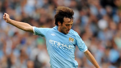David Silva shoots at goal against Valencia during a pre-season friendly in 2010. AFP
