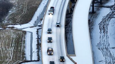 An icy mix in Roanoke, Texas, makes driving dangerous. The Dallas Morning News / AP