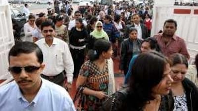 Parents on their way to meet the principal of Dubai Modern High School.