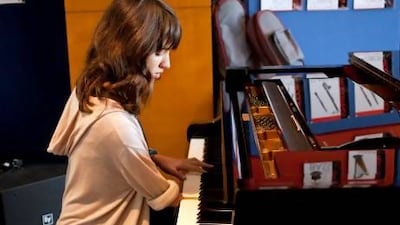 Victoria Canal, a 9th Grade student at GEMS World Academy, plays the piano. Razan Alzayani / The National