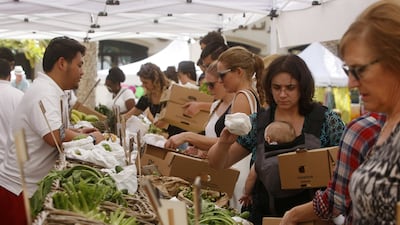 People attend the Ripe food and craft market at the The Collection at St Regis Saadiyat Island Resort in Abu Dhabi. Christopher Pike / The National