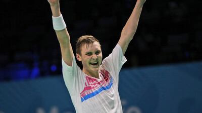 Viktor Axelsen celebrates after defeating Lee Chong Wei in a final match of the Dubai Badminton World Superseries Finals on Sunday. Kamran Jebreili / AP Photo