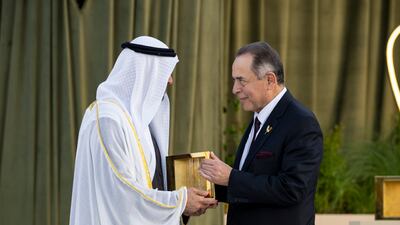 President Sheikh Mohamed presents the Zayed Award For Human Fraternity to Dr Nabil Hani Qaddumi, chairman of the board of directors of Taawon, on behalf of Taawon