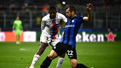 Henrikh Mkhitaryan – 7. Delivered a wicked cross that was eventually cut out by Pedri. Also contributed defensively, making a great tackle when Dembele tried to cut in, and showed plenty of energy until the very end. AFP