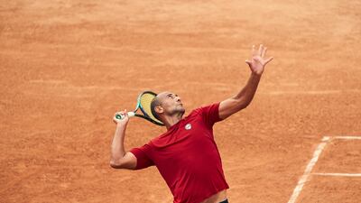 Mohamed Safwat serves against Ecuador. Omar Zain