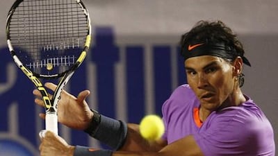 Rafael Nadal returns a shot from Jeremy Chardy at the Chilean Open.