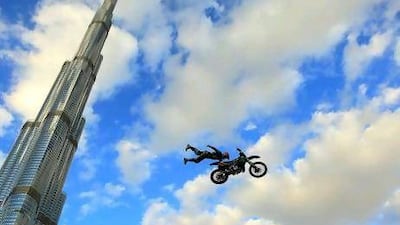 Freestyle Moto X stunt riders perform at Burj Park in Dubai. Satish Kumar / The National
