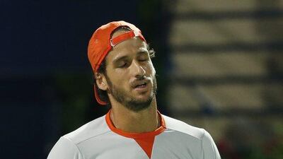epa05182452 Feliciano Lopez of Spain reacts during the semi final match against Marcos Baghdatis of Cyprus at Dubai Duty Free Tennis ATP Championships in Dubai, United Arab Emirates, 26 February 2016. EPA/ALI HAIDER