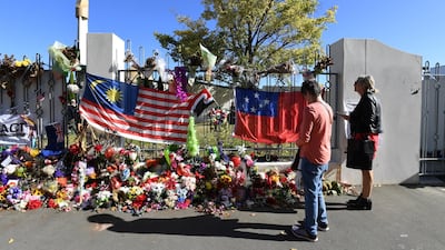 Visitors look at the memorial after Prince William's visit. Reuters