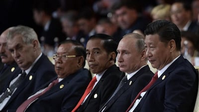 Indonesian president Joko Widodo, Russian president Vladimir Putin and Chinese president Xi Jinping in Beijing on Sunday, May 14. Alexei Nikolsky / AP