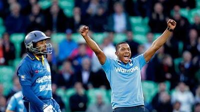 Chris Jordan, right, took three wickets for just 25 runs after he and his teammates were asked to 'express themselves'. Matt Dunham / AP Photo