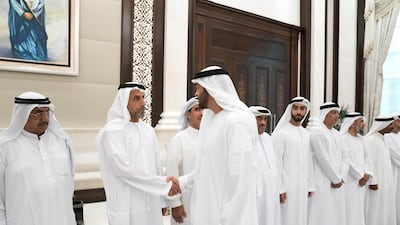 HH Sheikh Mohamed bin Zayed Al Nahyan Crown Prince of Abu Dhabi Deputy Supreme Commander of the UAE Armed Forces (R), greets a retired member of the UAE Armed Forces, during an iftar reception at Al Bateen Palace. Mohamed Al Hammadi / Crown Prince Court - Abu Dhabi