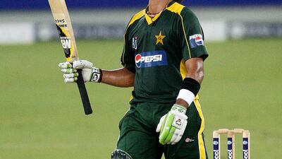 Umar Akmal celebrates scoring a half century for Pakistan against New Zealand in the second T20 match in Dubai on November 13, 2009. Pawan Singh / The National
