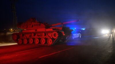 Turkish armed forces drive towards the border with Syria near Akcakale in Sanliurfa province. AFP