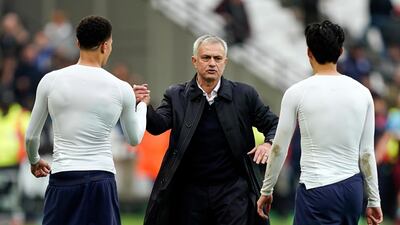 Jose Mourinho (C) of congratulates Dele Alli (L) and Son Heung-m after the 3-1 win over West Ham. EPA