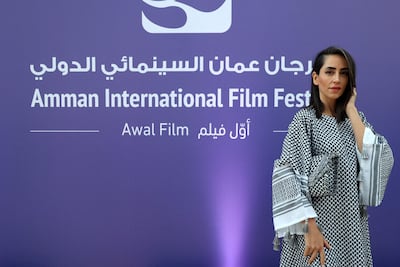Palestinian barrister and activist Mary Nazzal, dressed in a Palestinian keffiyeh, at the opening of the fifth Amman International Film Festival. AFP