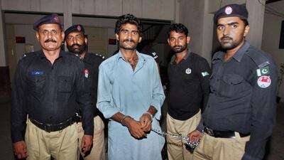 Waseem Azeem, pictured here in police custody in July, 2016, was charged in a court in Multan over the murder of his sister - social media star Qandeel Baloch. Asim Tanvee / AP Photo