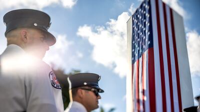 First responders from the city of Miami Beach, Florida, hold a joint observance. EPA