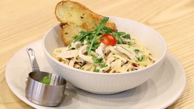 The Cajun Fiesta pasta is part of the "naughty" section and has Cajun chicken, butter, peppers, mushrooms, basil and Parmesan. Chris Whiteoak / The National