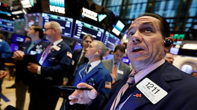 Tommy Kalikas, right, works with fellow traders on the floor of the New York Stock Exchange. Stock investors have been on a harrowing round trip over the last seven months, but the market may be in a healthier place after it. AP