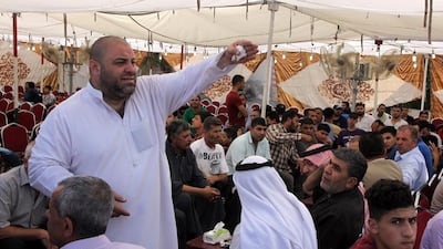 The father of one of the men shot gestures at a funeral reception for his son in Amman on July 24, 2017. Ahmed Abdo / EPA