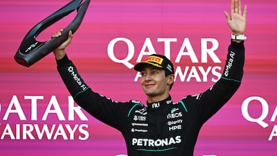 George Russell celebrates on the podium after winning the Azerbaijan Grand Prix at Baku City Circuit on September 26, 2026. Getty Images