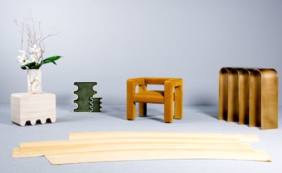 From left: 'Ossicle' marble stool; 'Ossicle' tray, both by Francesco Balzano X Giobagnara; 'Stroke 1.0' by Sabine Marcelis; 'Toptun' armchair by Faina; 'Steel Gold Arch' by Pietro Franceschini. Photo: Gallery Collectional