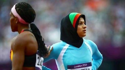 Afghanistan's Tahmina Kohistani (right) after competing in the women's 100m heats during the London 2012 Olympic Games.