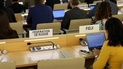 The seat for the representative of Russia sits empty during a Human Rights Council special session. Reuters