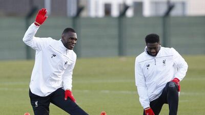 Football Soccer - Liverpool Training - Liverpool Training Ground - 24/2/16Liverpool's Christian Benteke and Kolo Toure during trainingAction Images via Reuters / Carl RecineLivepicEDITORIAL USE ONLY.