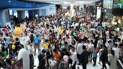 People visit Wanda City. Wanda's billionaire boss has stated he intends to take on and beat Disney weeks before the American entertainment group launches a similar attraction in Shanghai. AFP