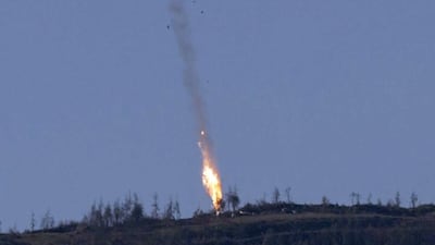 The Turkish military said it shot down a plane after it was repeatedly warned about violating Turkish airspace. HaberTurk TV / EPA